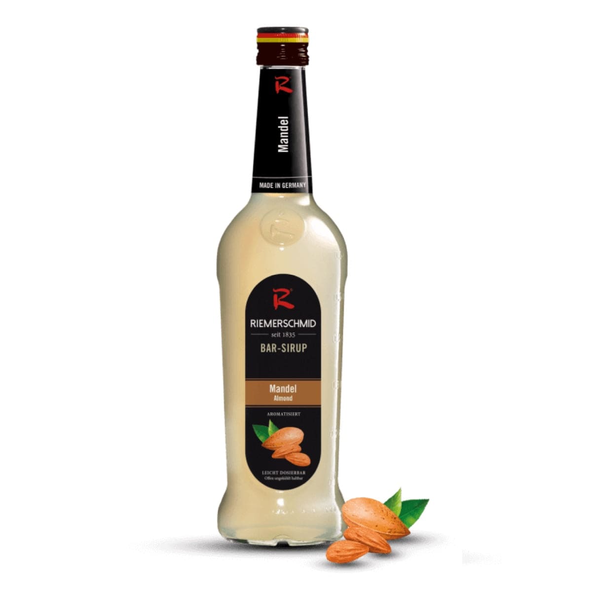 Riemerschmid Mandelsirup – fyldig og aromatisk sirup med klassisk mandelsmag, ideel til kaffe, cocktails og bagværk.