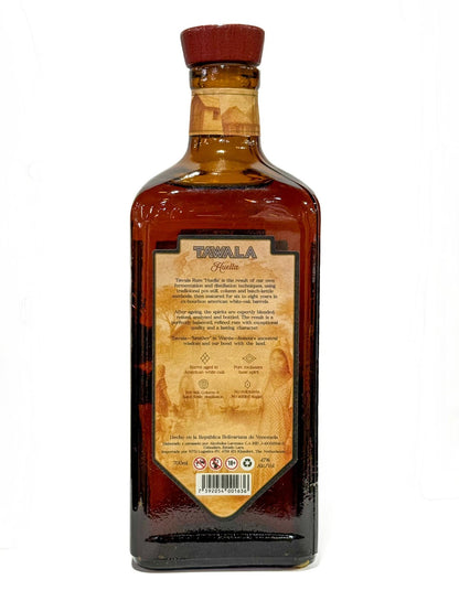 Bagsideetiket på Tawala Huella rom 70 cl, 47 procent