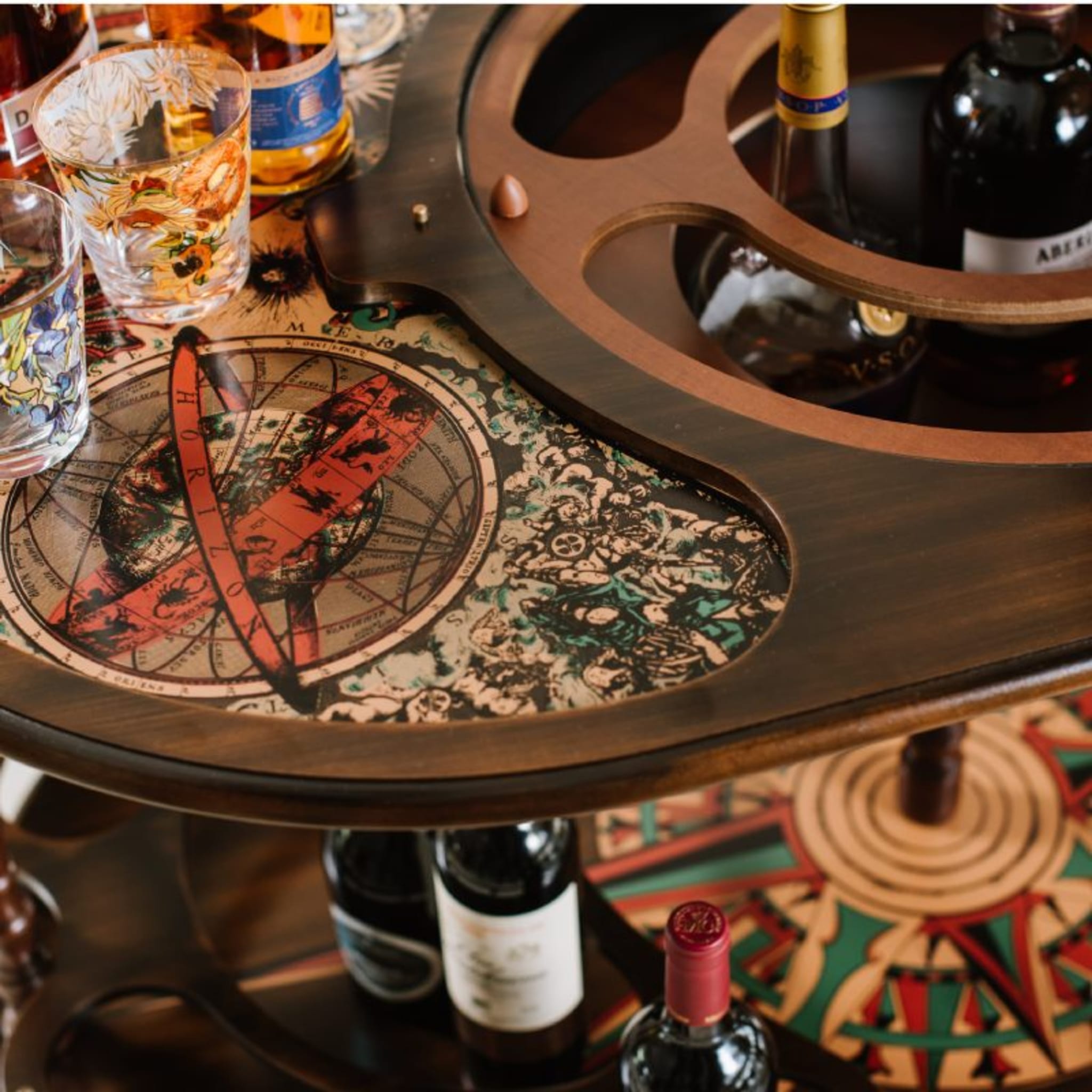 Make your gatherings unforgettable with this charming and functional Sophistication Globe Bar.
